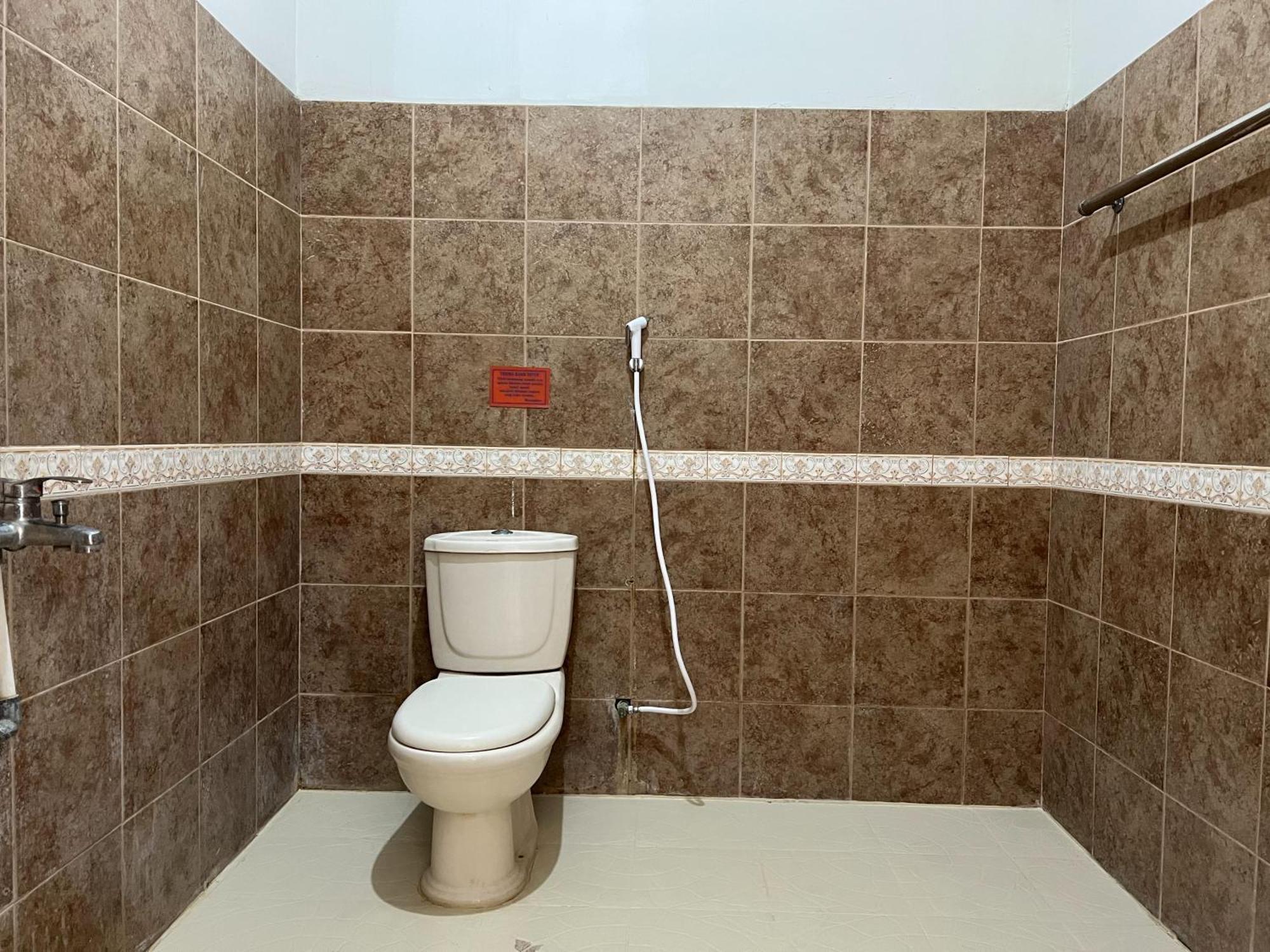 Hotel Oyo 92098 Kost Orange Syariah à Makassar Extérieur photo
